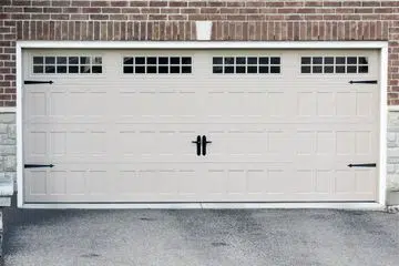 White two-car carriage-style garage door
