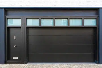 Black contemporary garage door with vertical windows