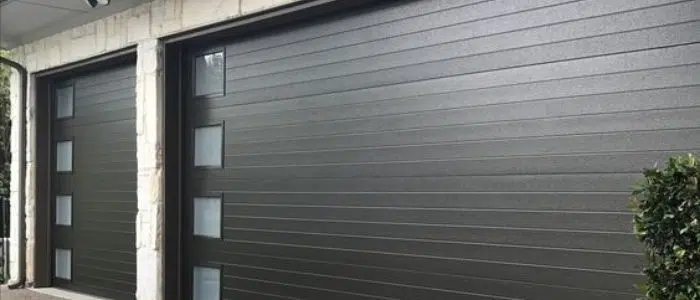 Black modern garage door with windows