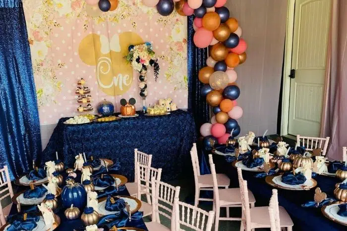 Blue themed children's birthday party with garage walls covered by curtains