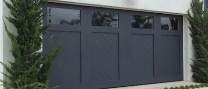 Charcoal two-car garage door with windows