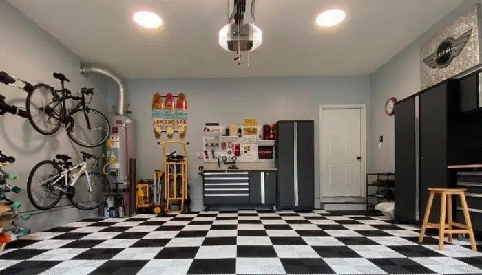 Garage with checkerboard floor and neutral walls