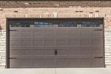Brown Prairie-style garage door with window band