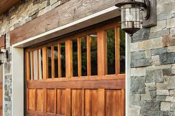 Wood Craftsman-style garage door with windows