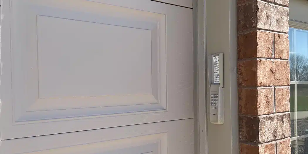 Craftsman wireless keypad mounted beside a garage door